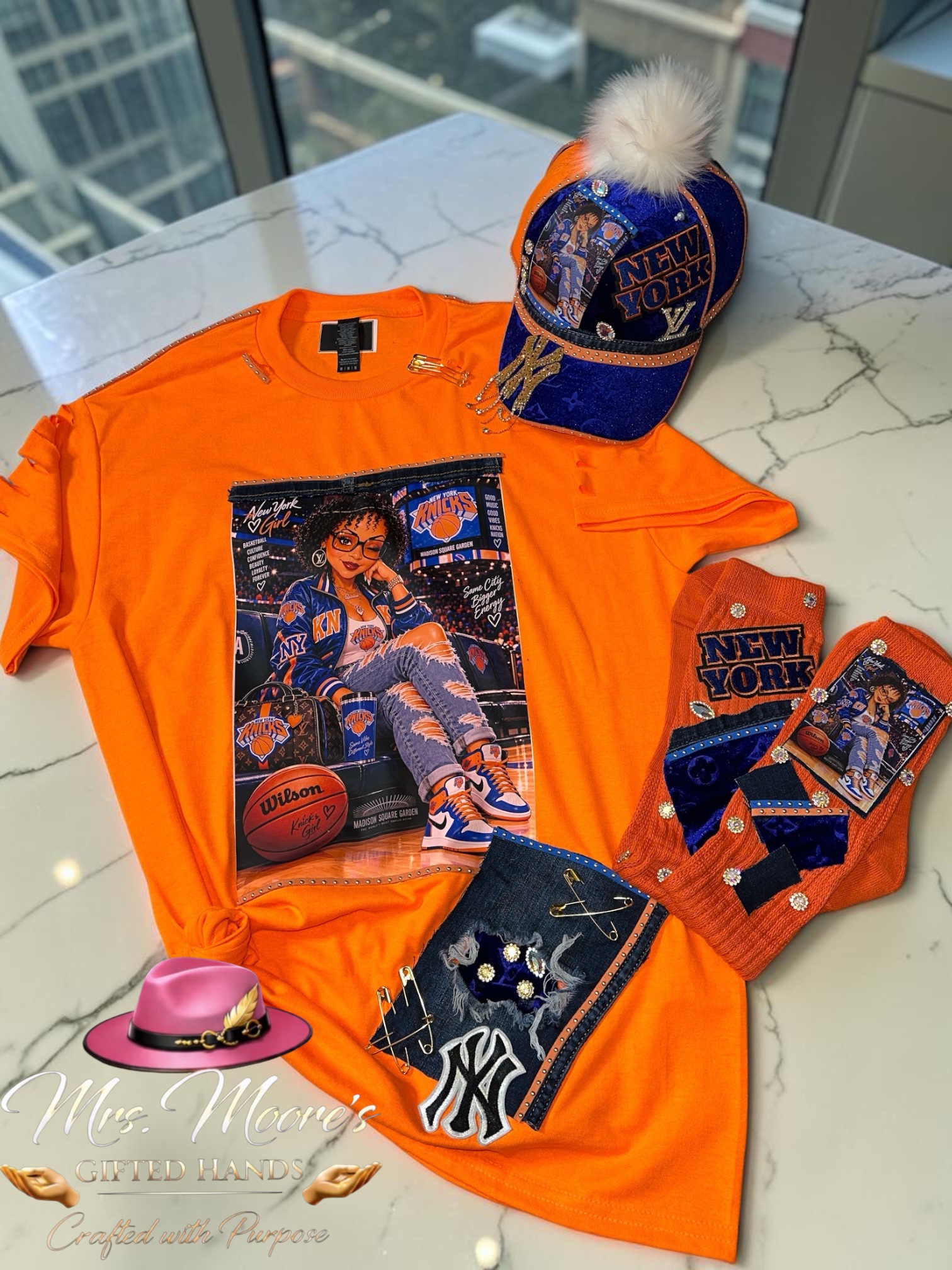 Orange and blue custom three-piece art set displayed with cap, shirt and matching socks